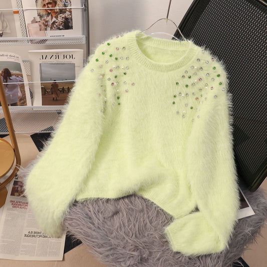 A diamond-encrusted fluffy top sweater