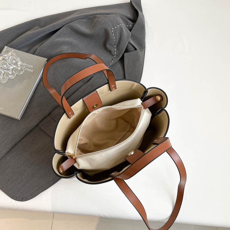 A large capacity shoulder bag