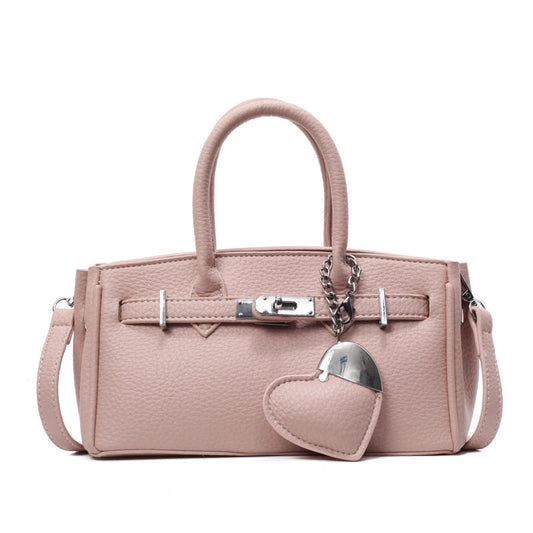 A heart-shaped pendant handbag