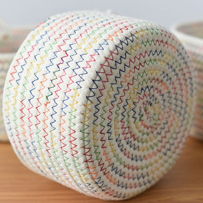 A woven fabric storage basket