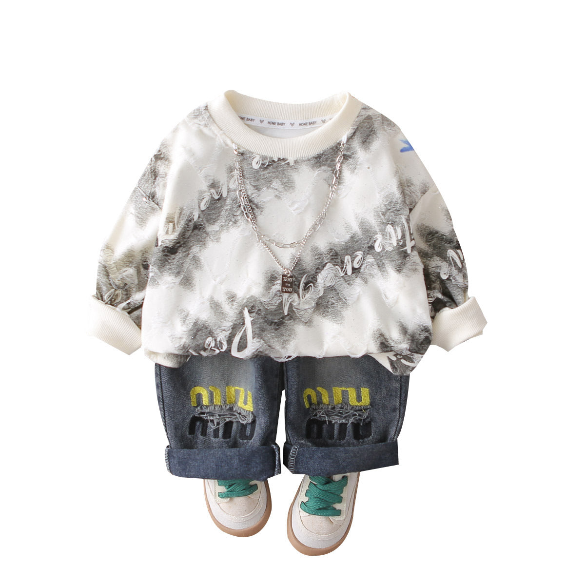 A children's sweater jeans set