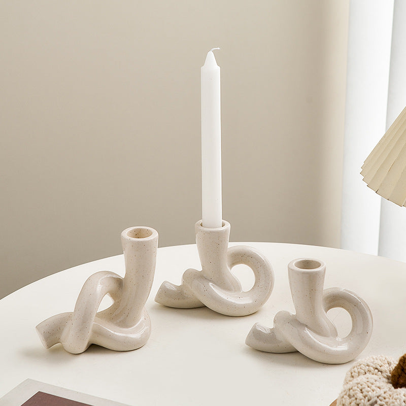 A ceramic candle holder ornament
