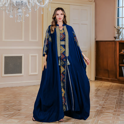 A two-piece dress with embroidered robes