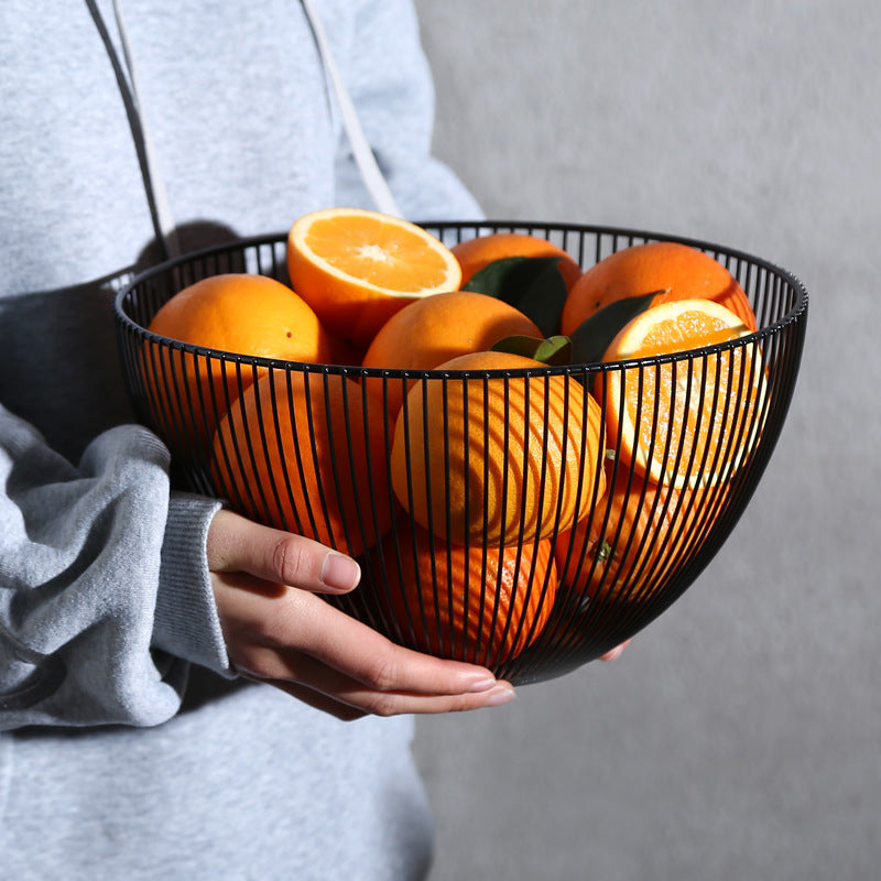 A wrought iron snack pot fruit plate storage