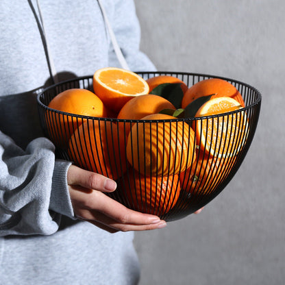 A wrought iron snack pot fruit plate storage