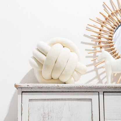 A braided ball pillow