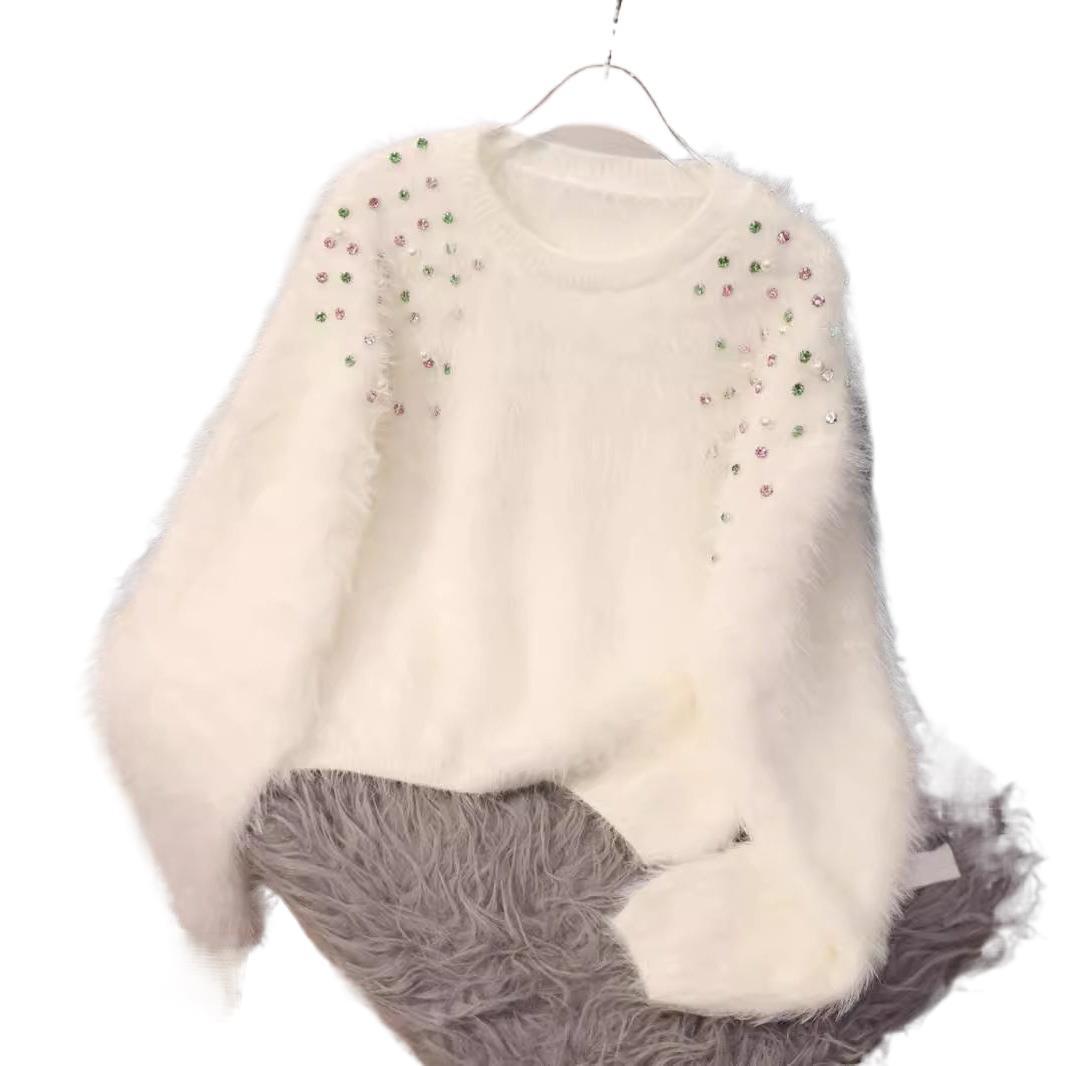 A diamond-encrusted fluffy top sweater