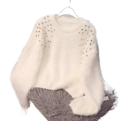 A diamond-encrusted fluffy top sweater