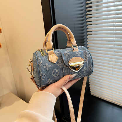 A denim bag cylinder bag