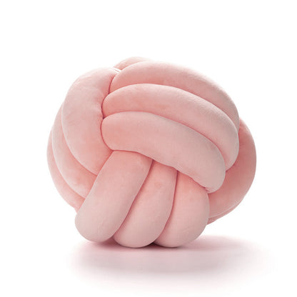 A braided ball pillow