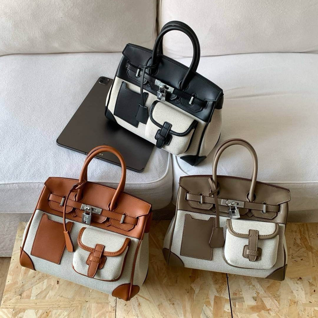 A spring new contrasting color canvas leather pocket platinum bag versatile casual shoulder oblique span women's bag