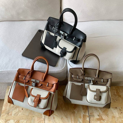 A spring new contrasting color canvas leather pocket platinum bag versatile casual shoulder oblique span women's bag