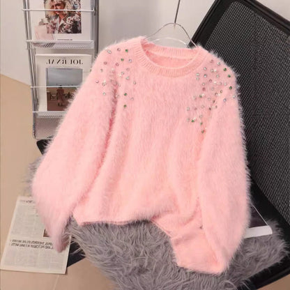 A diamond-encrusted fluffy top sweater
