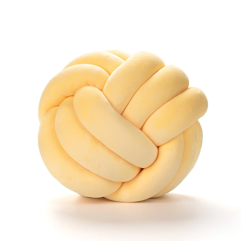 A braided ball pillow