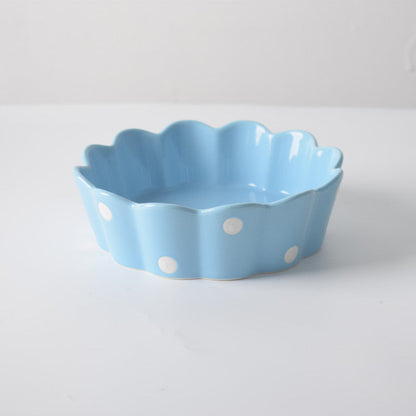 A polka dot ceramic bowl