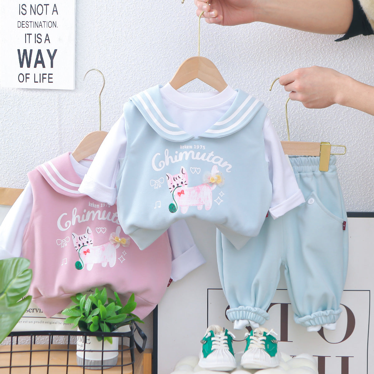 A children's long-sleeved three-piece set