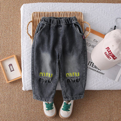 A children's sweater jeans set