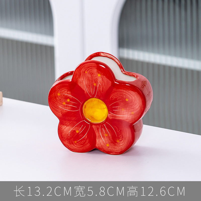 A ceramic pen holder storage ornament