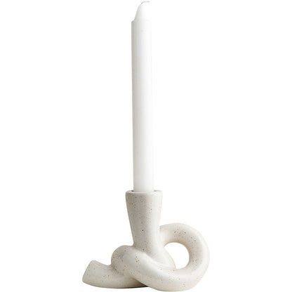 A ceramic candle holder ornament