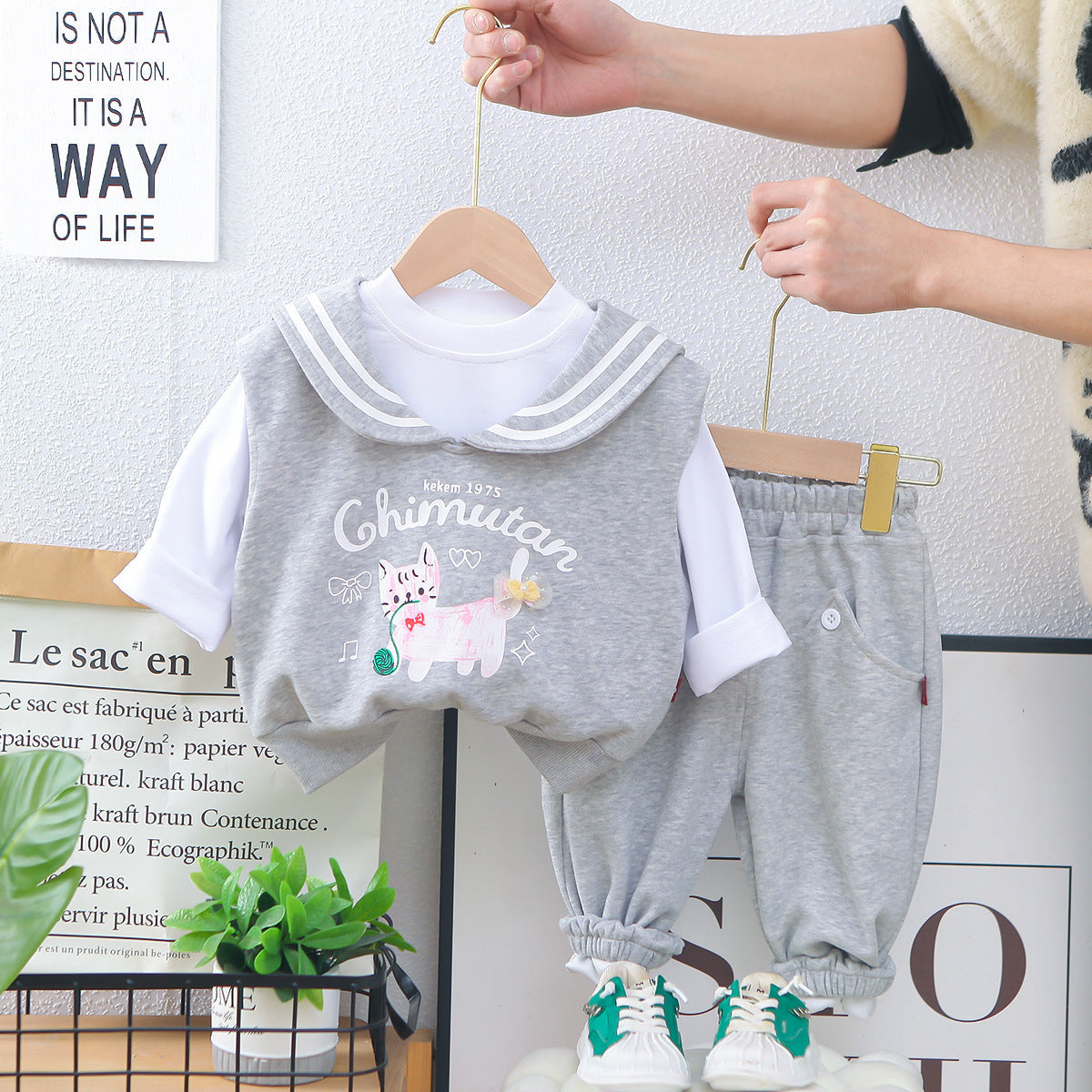 A children's long-sleeved three-piece set