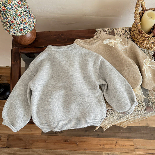 A children's knitted sweater