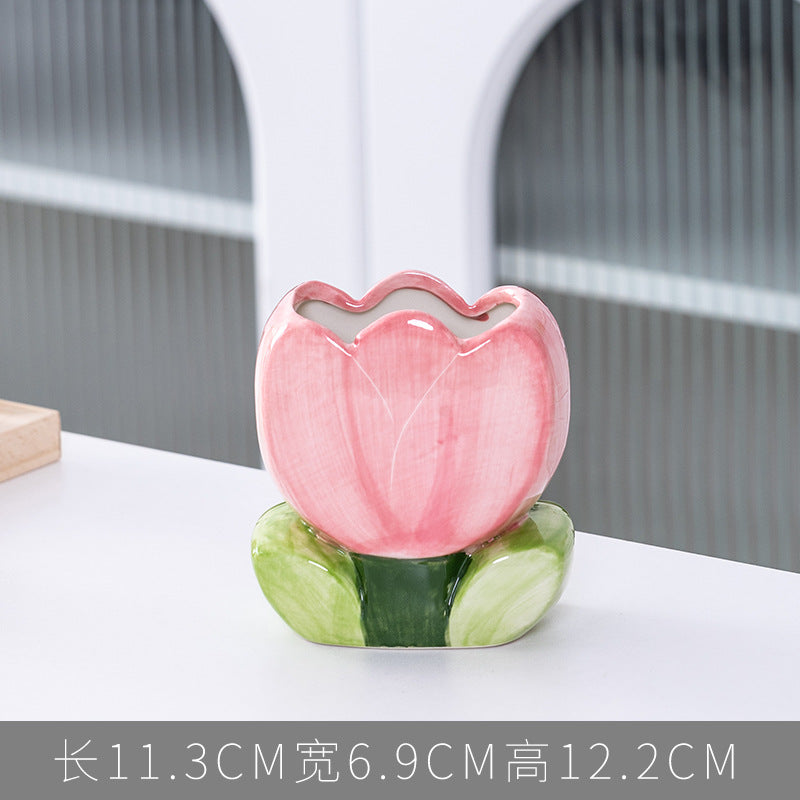 A ceramic pen holder storage ornament