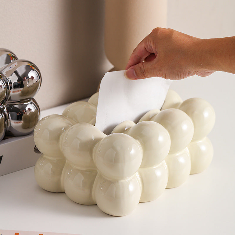 A ceramic tissue box ashtray