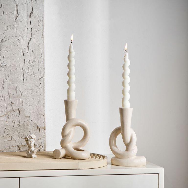 A ceramic candle holder ornament