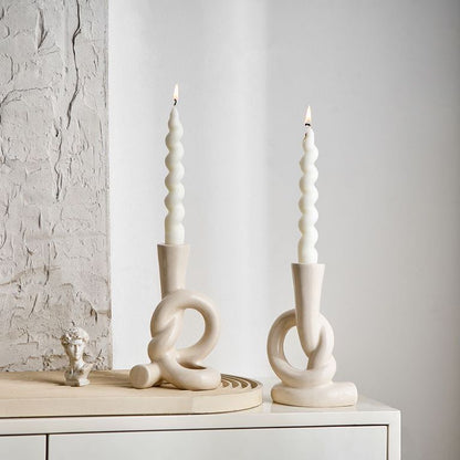 A ceramic candle holder ornament