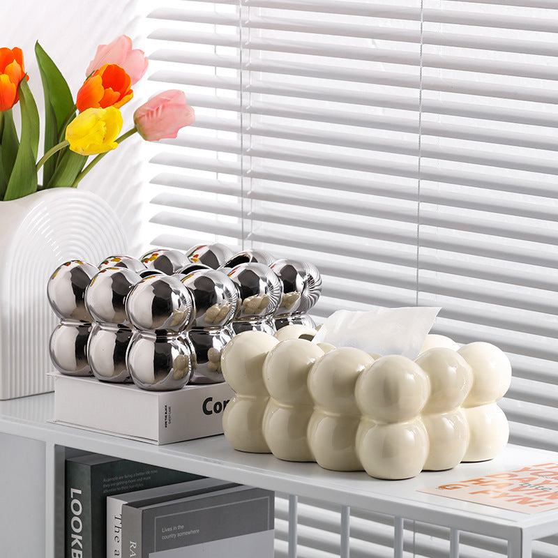 A ceramic tissue box ashtray