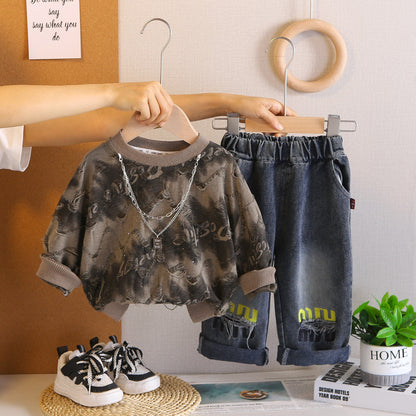 A children's sweater jeans set