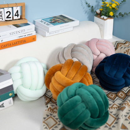 A braided ball pillow