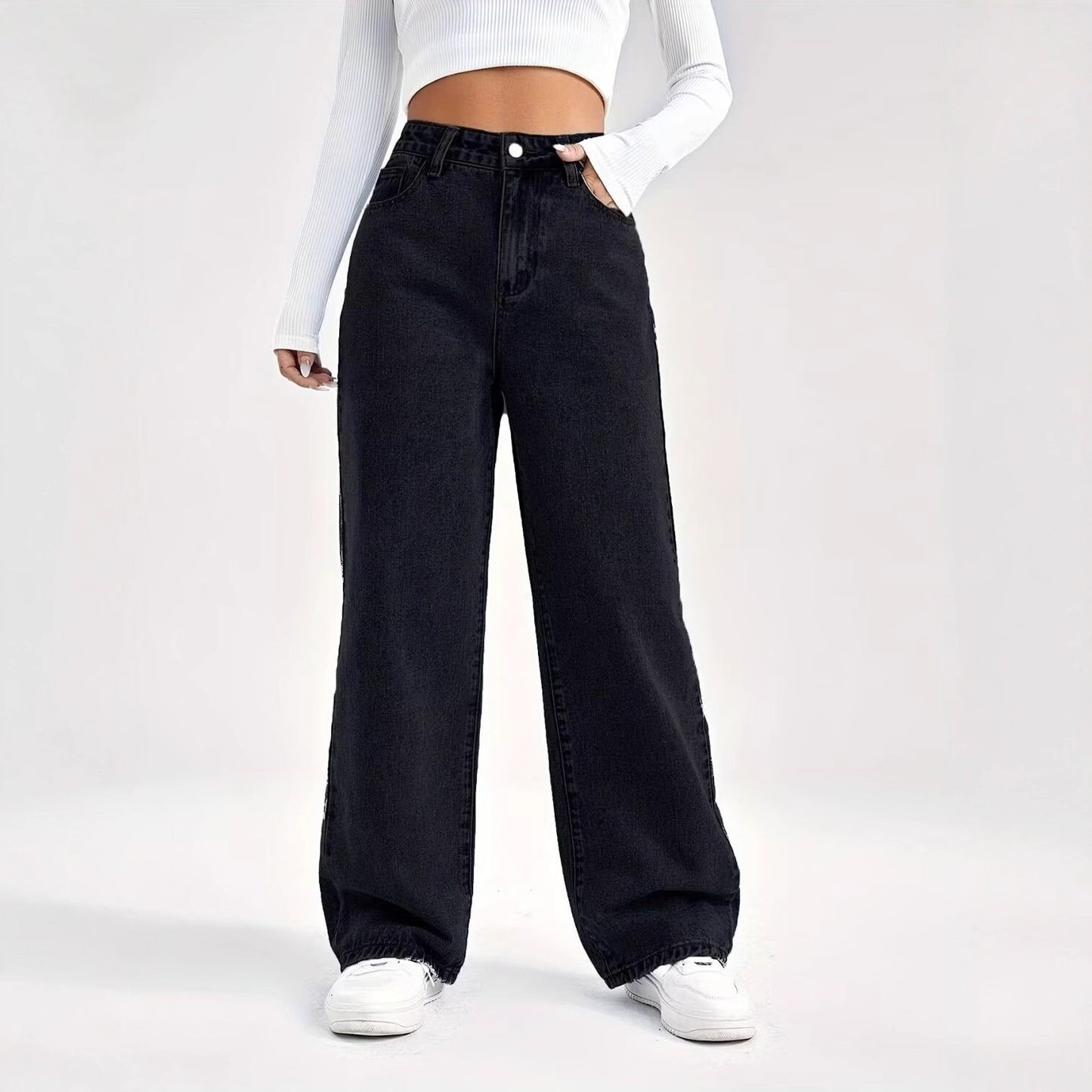 A high-waisted slim-fit straight denim trousers are popular