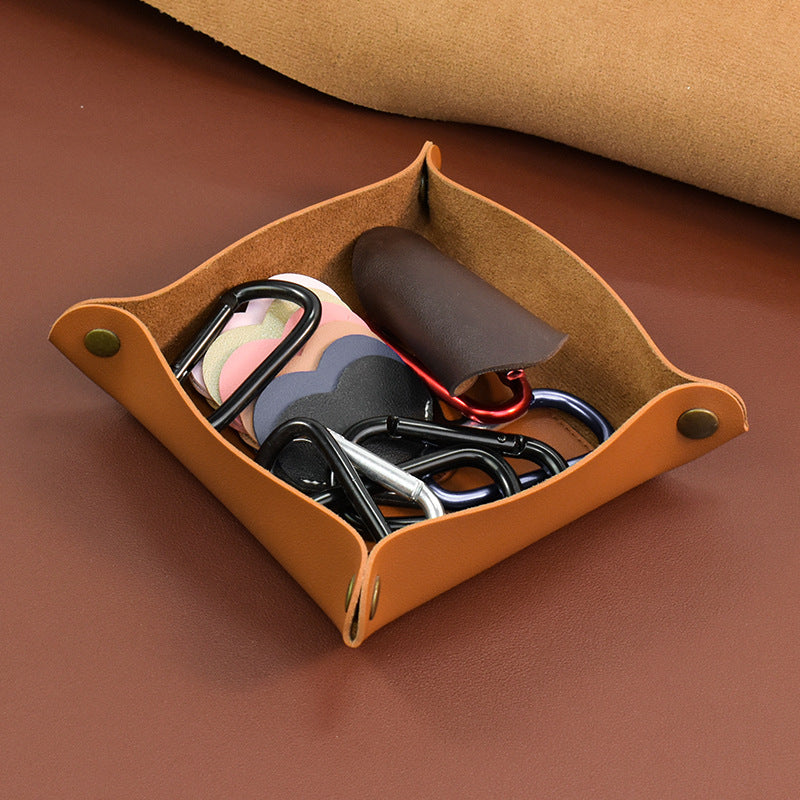A leather storage tray