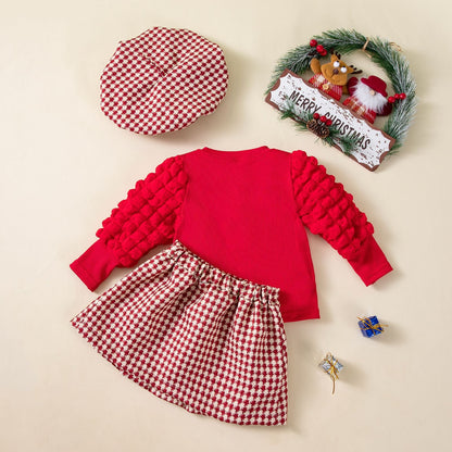 A children's long-sleeved mesh dress