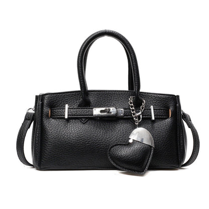 A heart-shaped pendant handbag