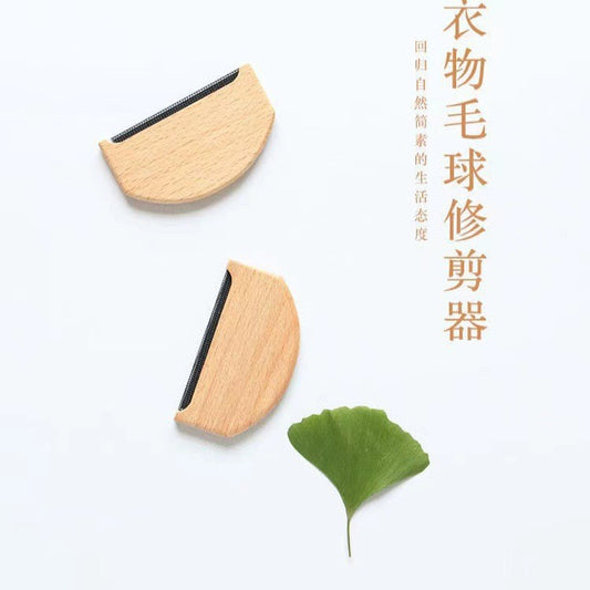 A clothing manual hairball remover