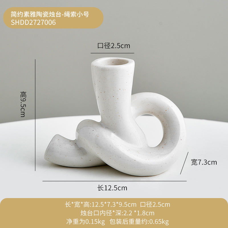 A ceramic candle holder ornament