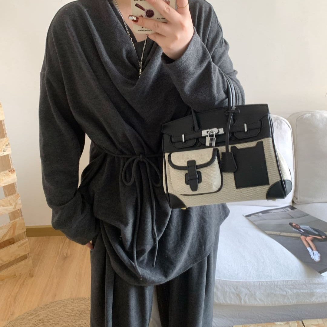 A spring new contrasting color canvas leather pocket platinum bag versatile casual shoulder oblique span women's bag