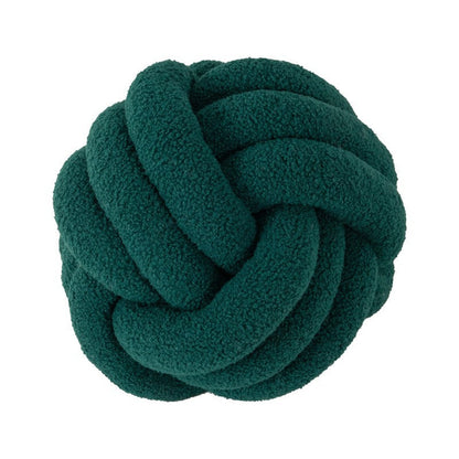 A braided knotted ball pillow