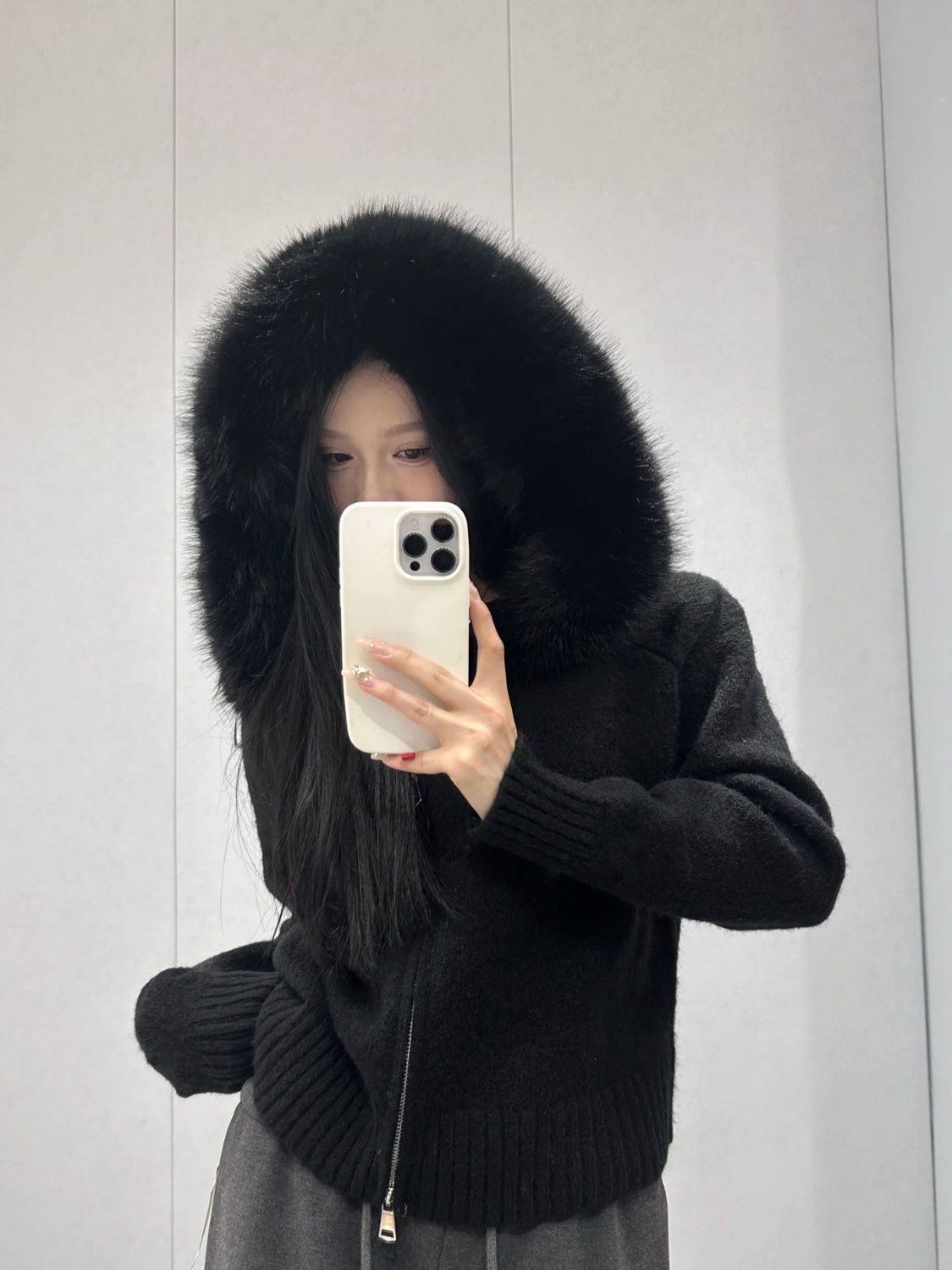 A fur collar knitted hooded sweater cardigan